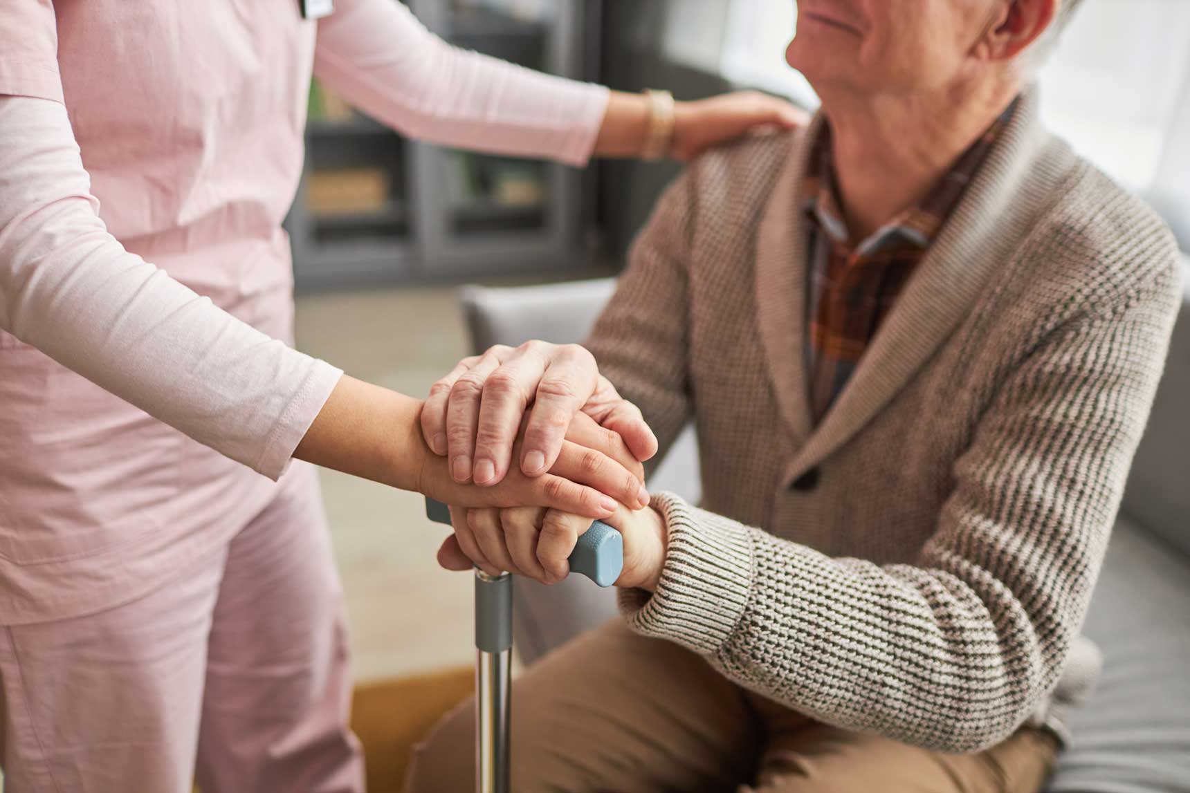 opt_caregiver-caring-about-elderly-man-2023-03-01-22-40-08-utc
